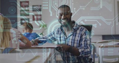 Smiling teacher guiding students with tablet and digital circuitry overlay in classroom