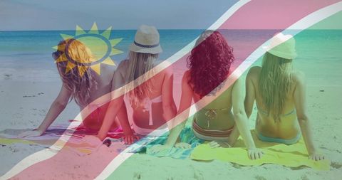 Friends enjoying relaxing day at sunny beach