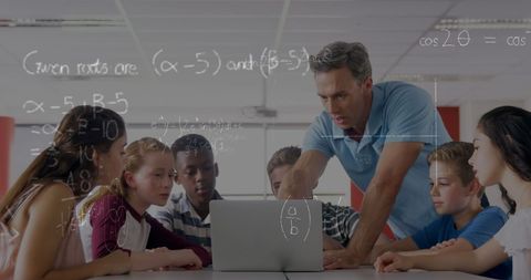 Teacher Leading Group of Diverse Students Learning Math on Laptop - Download Free Stock Images Pikwizard.com