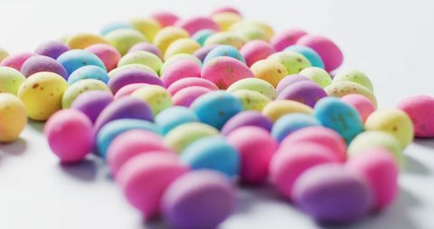 Vibrant colorful easter eggs decorating bright background