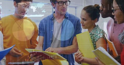 Diverse Team Collaborating on Data Analytics in Office