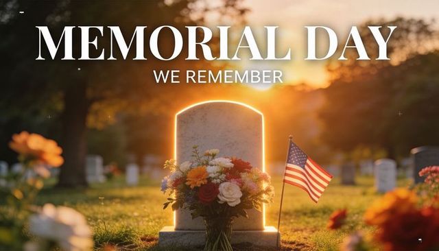 Memorial day tribute backlit headstone with flowers and american flag at golden sunset