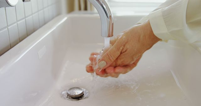 Close-up of Hands Washing Under Running Water in Sink - Download Free Stock Images Pikwizard.com