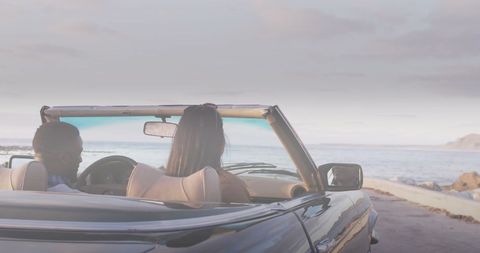 Couple Driving Convertible by Scenic Coastal Road - Download Free Stock Images Pikwizard.com