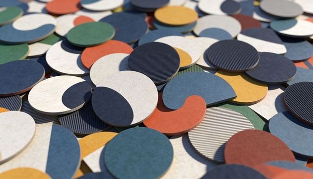Colorful layered paper discs with corrugated texture macro abstract composition for design
