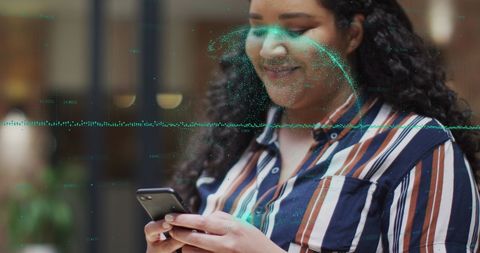 Biracial Woman Engaging with Smartphone and Digital Globe