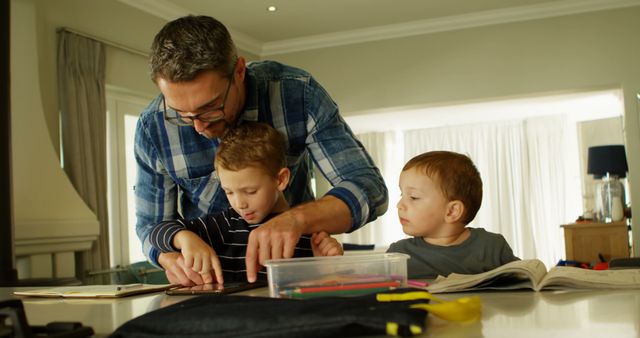 Father Help Children with Homework in Modern Kitchen - Download Free Stock Images Pikwizard.com