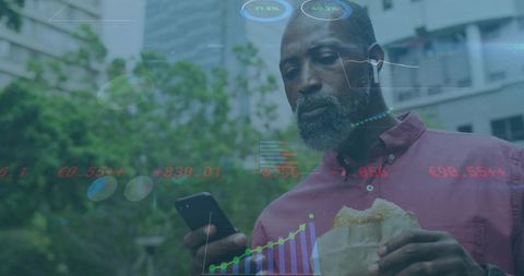 Professional Analyzing Charts Outdoors on Mobile Device