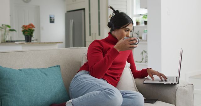 Woman Working from Home While Drinking Coffee and Using Laptop - Download Free Stock Images Pikwizard.com