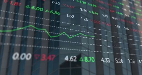 Stock Market Data Trends on Skyscraper Glass Facade