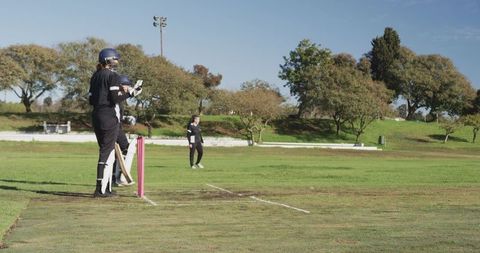 Female Cricket Player in Focus During Intense Match