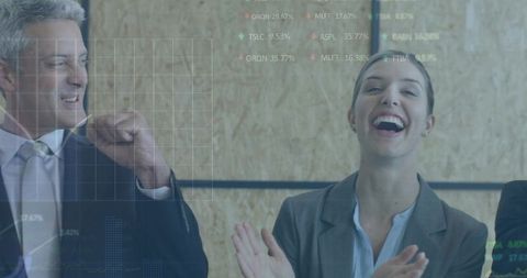 Business Team Celebrating Success in Corporate Meeting with Financial Data Overlay