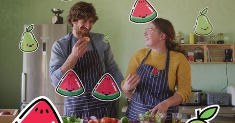 Happy Couple Cooking with Playful Fruit Icons Overlay