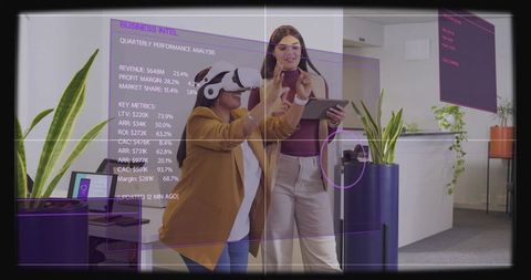 Collaborating in mixed reality workspace with vr headset and holographic analytics dashboard