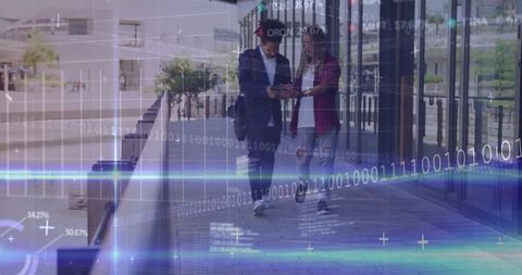 Young Professionals Analyzing Data Outdoors with Binary Code Overlay