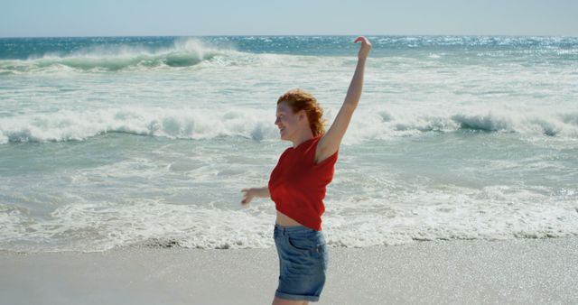 Joyful Woman Dancing on Beach in Daytime - Download Free Stock Images Pikwizard.com