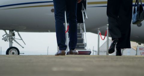 Business Professionals Boarding Private Jet for Corporate Travel - Download Free Stock Images Pikwizard.com