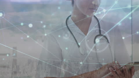 Doctor Using Tablet with Digital Network Overlay