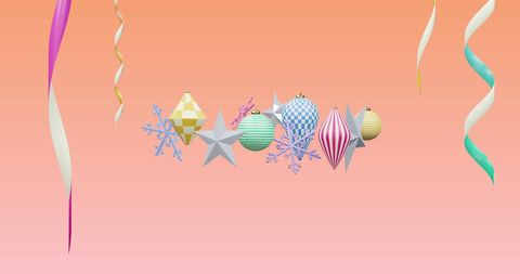 Colorful Festive Ornaments against Pink Background