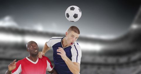 Soccer players compete mid-air for ball