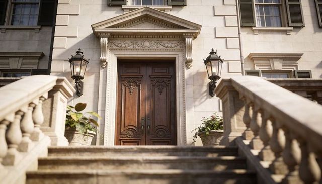 Neoclassical mansion entrance with carved double doors, stone steps and ornate lanterns