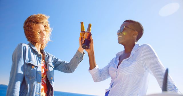 Friends Enjoying Beers at the Beach - Download Free Stock Images Pikwizard.com