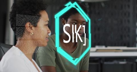 Diverse Professionals in Office Discussing NFT