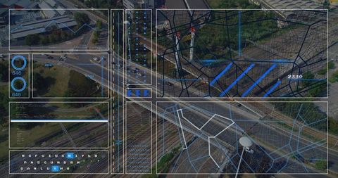 Aerial view of futuristic urban highway with digital data overlay