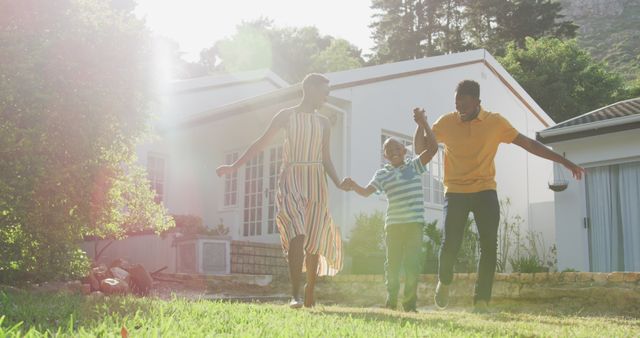 Family Enjoying Outdoor Time in Front Yard of Modern Home - Download Free Stock Images Pikwizard.com