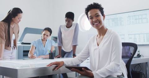 Confident Businesswoman with Diverse Team in Modern Office - Download Free Stock Images Pikwizard.com