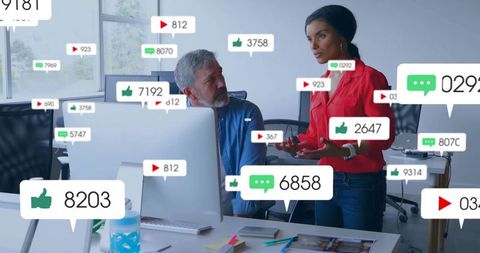 Colleagues engaging in social media analysis for digital marketing