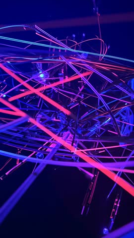 Tilting Reveal of Neon Rod Sculpture with LED Nodes, Futuristic Vertical Video