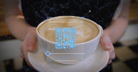 Digital qr code scan over coffee cup in woman's hands