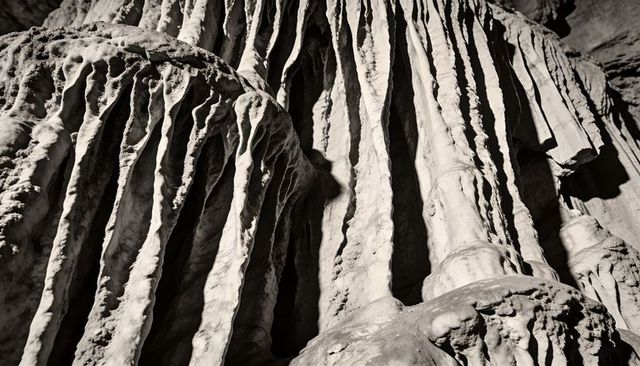 Forming rippled calcite draperies and flowstone curtains in limestone cavern