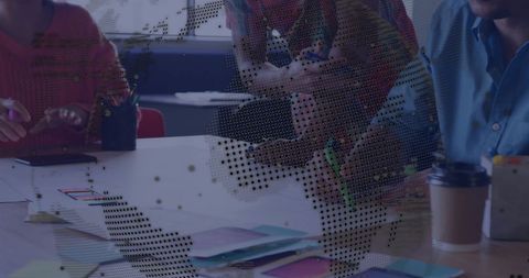 Team Collaborating on Innovative Solutions with Digital Overlay