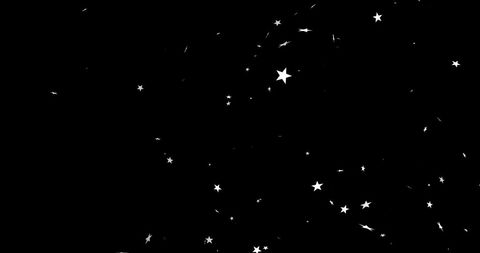 Falling christmas stars over black background