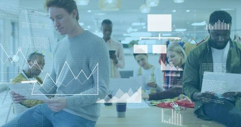 Creative Professionals Analyzing Reports with Digital Designs