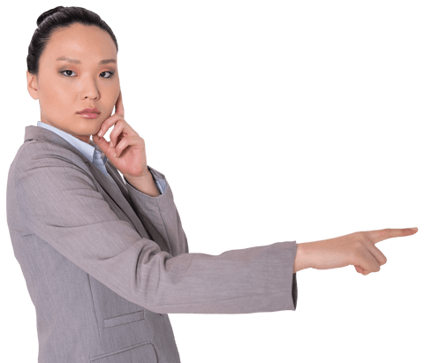 Influential Asian Businesswoman Pointing with Confidence Transparent Background