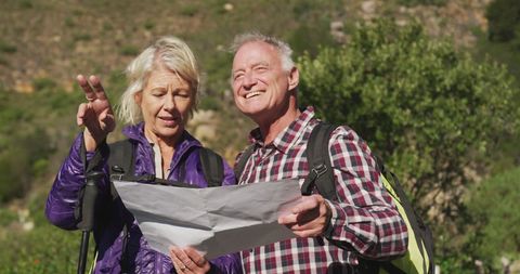 Senior Couple Hiking with Map in Scenic Mountain Background - Download Free Stock Images Pikwizard.com