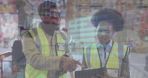 African American Warehouse Workers Analyzing Data with Digital Analytics Overlay