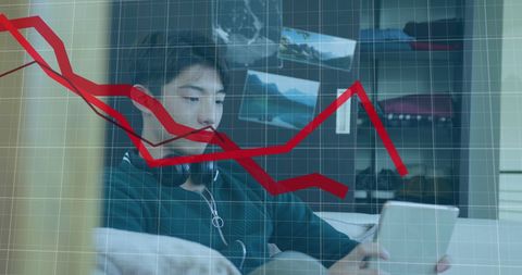 Teen Engaged in Gaming Amidst Financial down trend Graphics - Download Free Stock Images Pikwizard.com