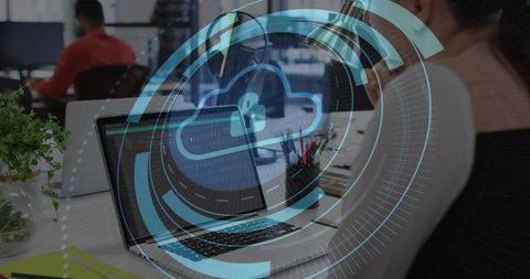 Securing cloud data with holographic lock interface on laptop in busy open office