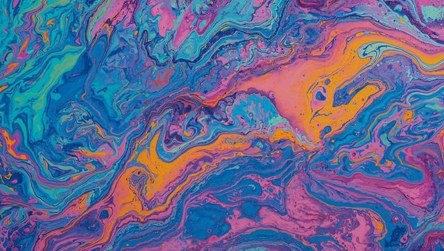 Abstract fluid art with vibrant swirling colors