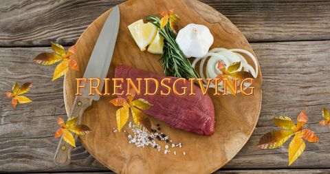 Friendsgiving Celebratory Setting with Autumn Leaves and Ingredients