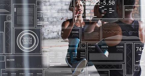 Female Athlete Performing Sit-up with Male Trainer Supporting Feet and Digital HUD Fitness Data