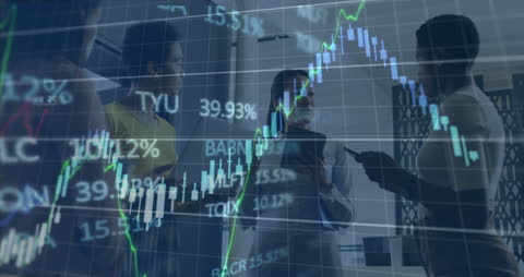 Diverse Business Team Analyzing Financial Data on Transparent Screen