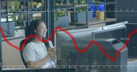 Businesswoman Analyzing Financial Data in Office Setting