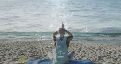 Meditating on Beach with Seascape Overlay Concept