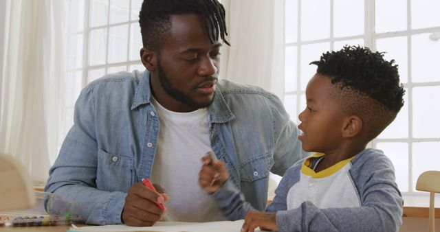 Father and Son Spending Quality Time Drawing Together - Download Free Stock Images Pikwizard.com