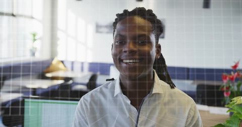 Smiling professional working in modern office environment